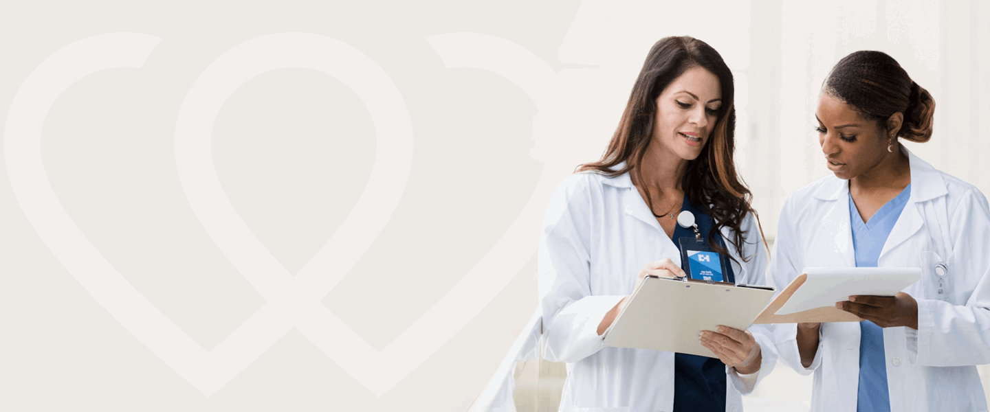 two doctors reviewing a patient's chart