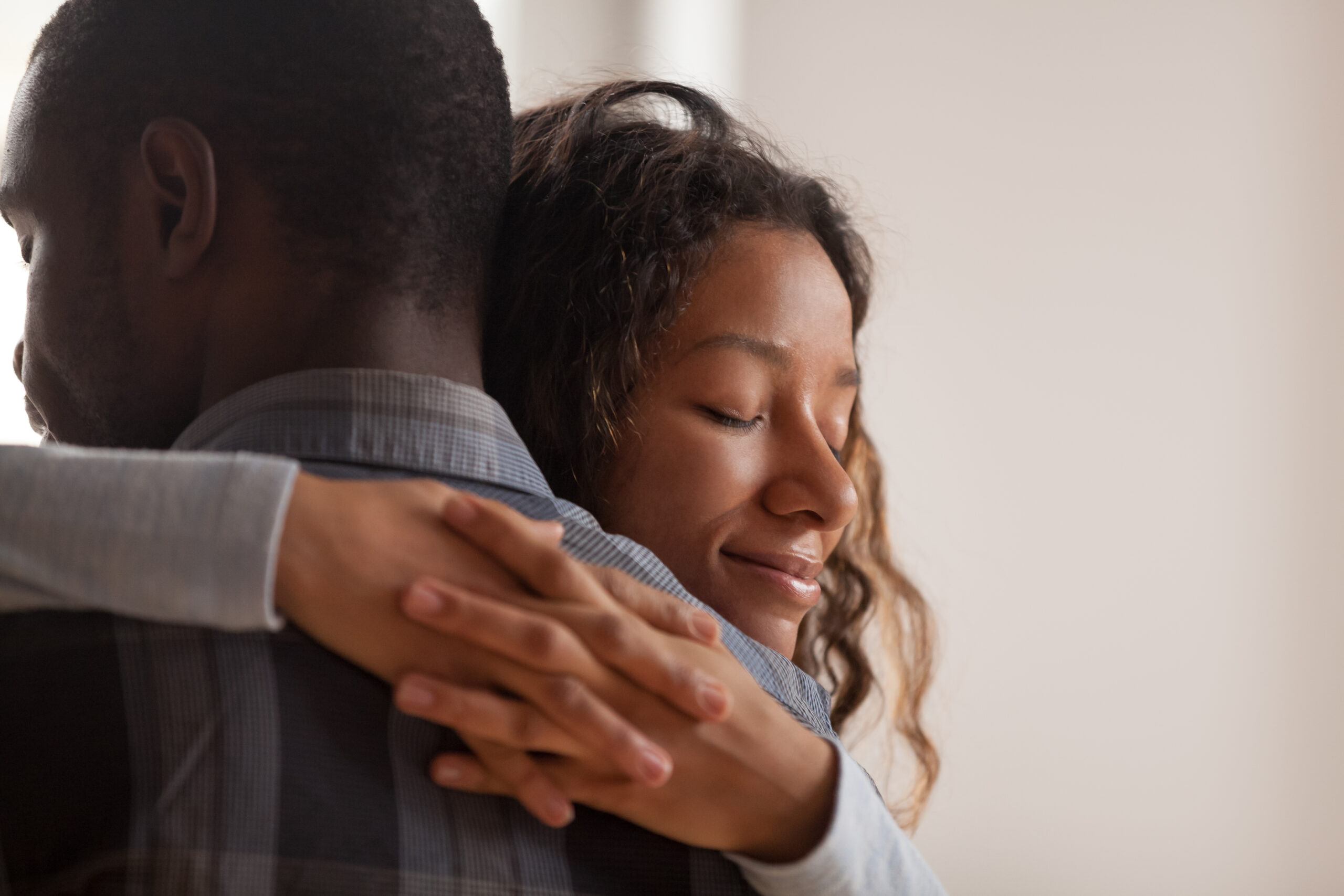 a man and woman hugging