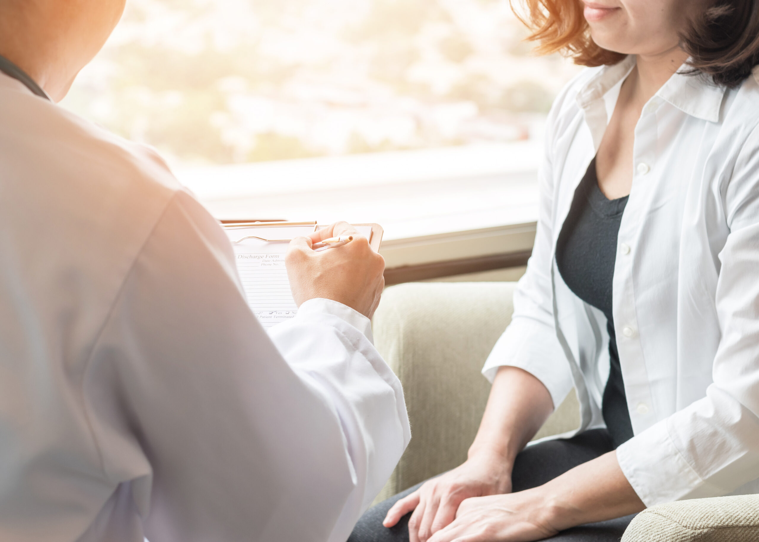 a doctor talking with a patient