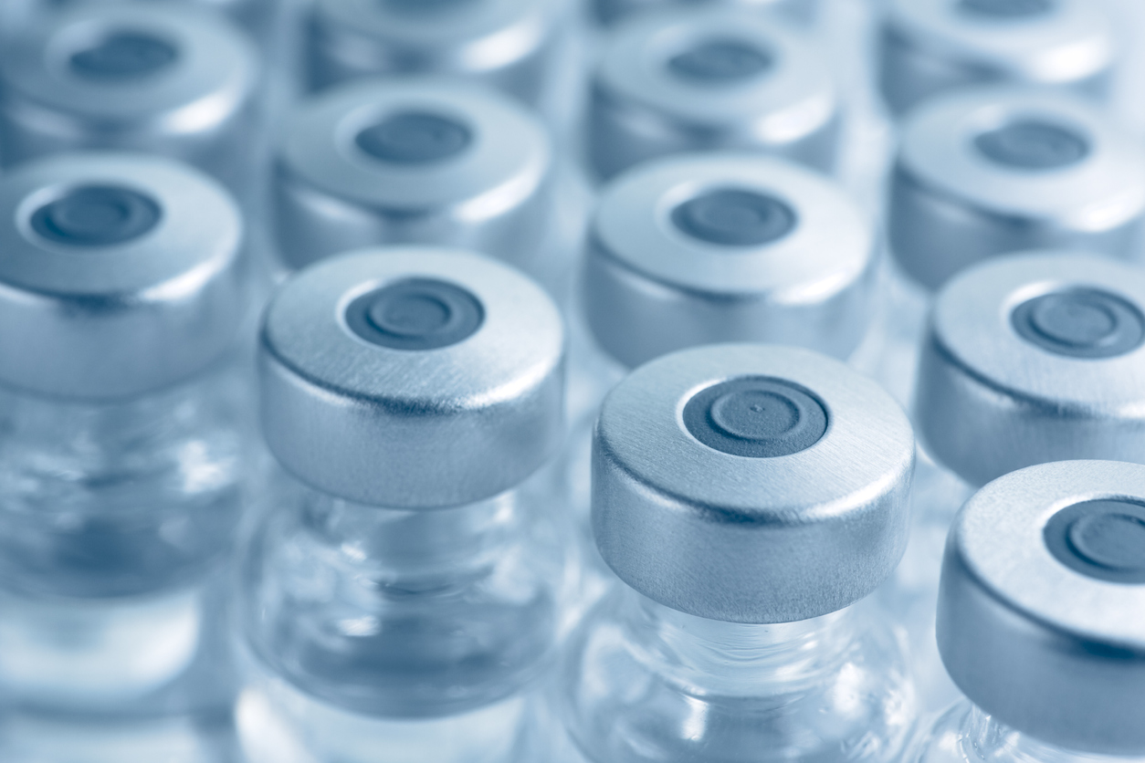 Bottles of vaccines lined up.